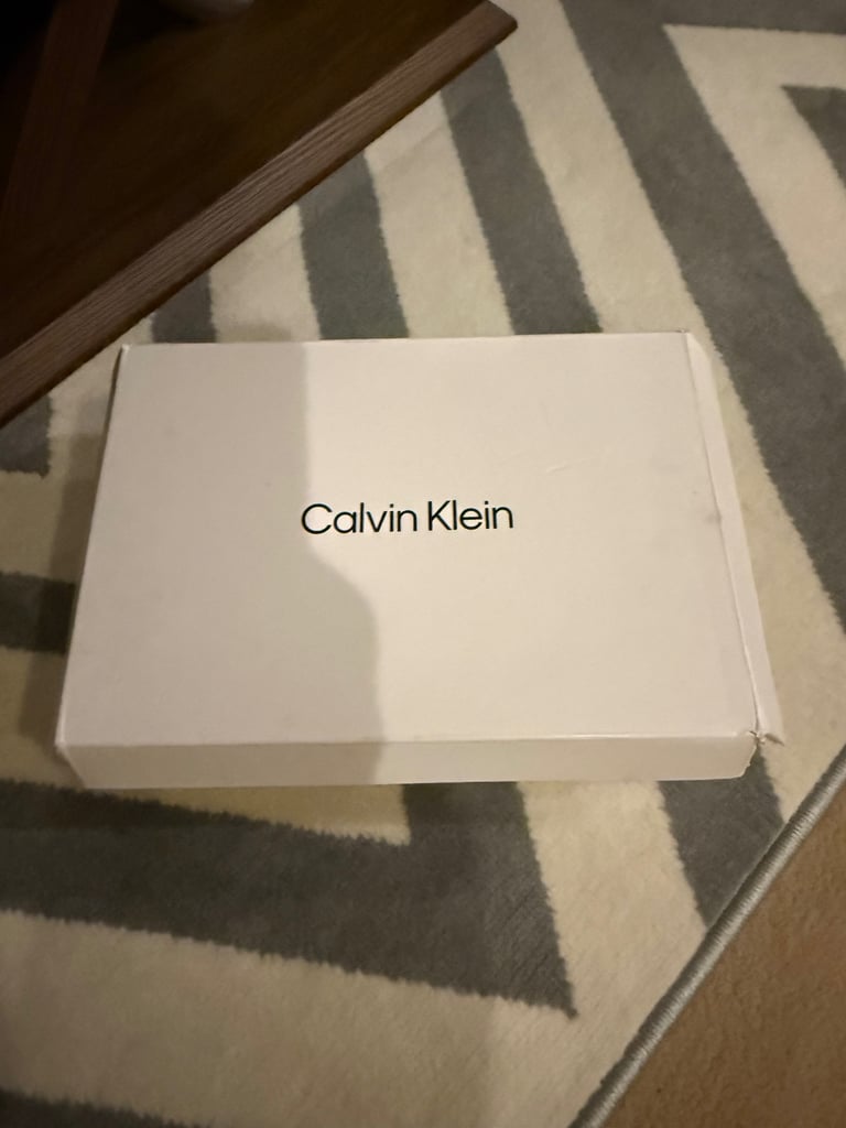 BRAND NEW CALVIN KLEIN TRAINERS 