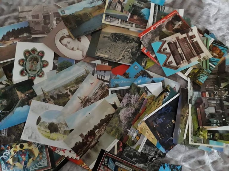 100 RANDOM POSTCARDS.