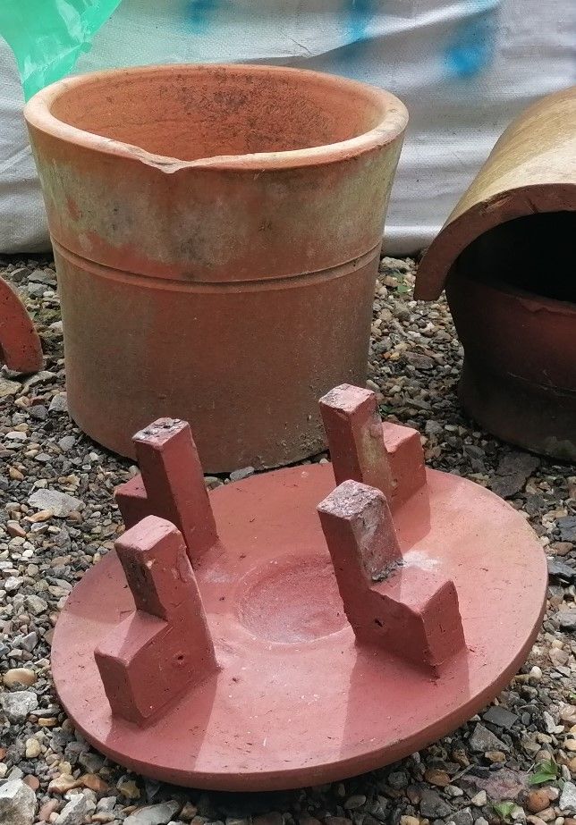 Terracotta chimney pots and top hat