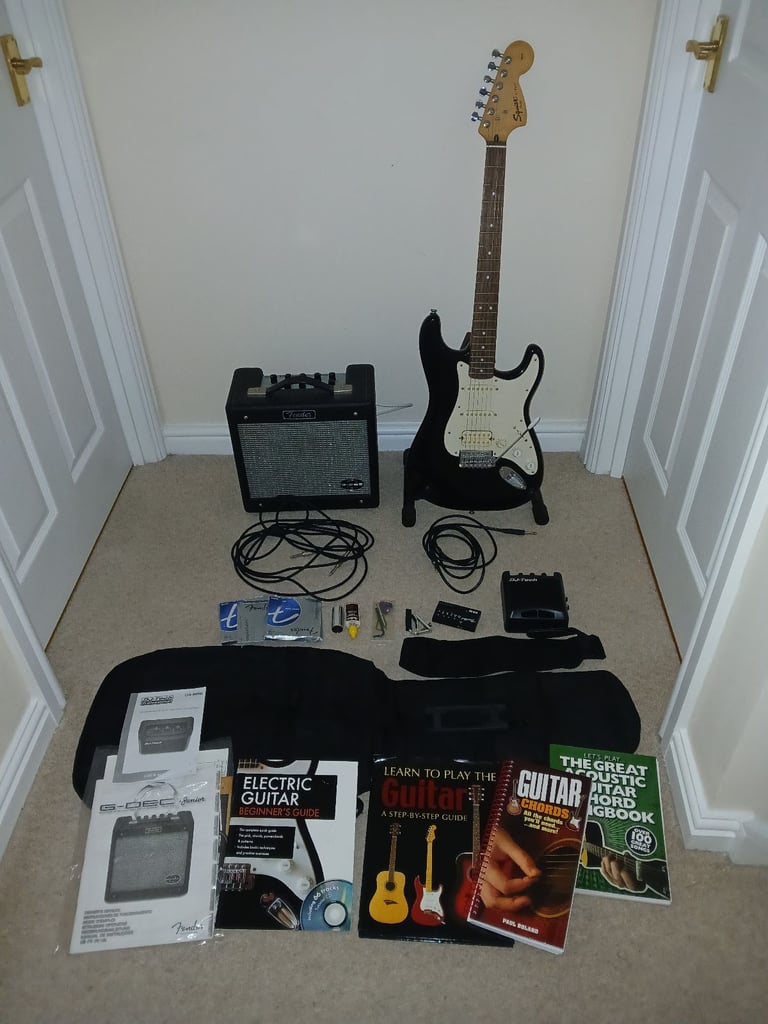 image for Fender Stratocaster (Squier), G-DE Amp and accessories (Leads/Strap/Case/Tuner/Mini Amp/etc)