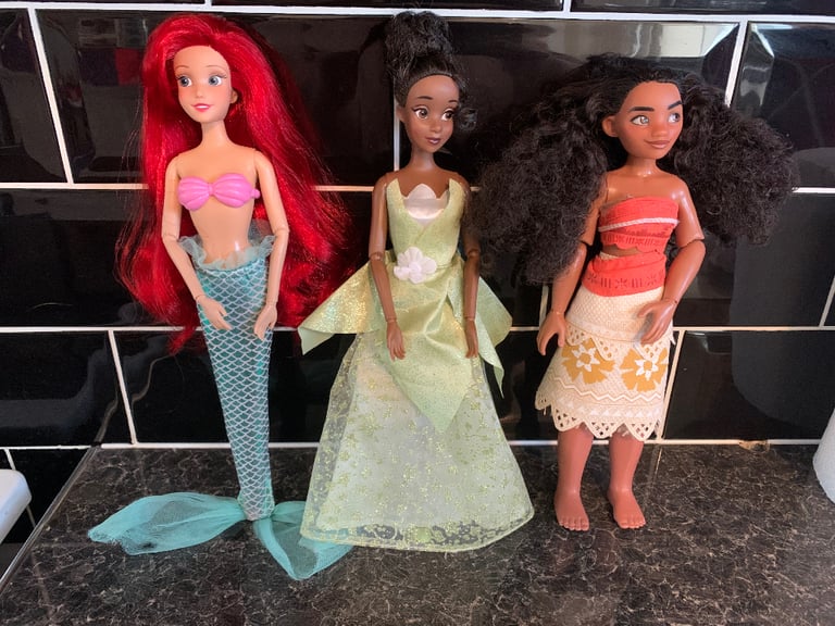 image for Disney store tiana, moana and Ariel dolls