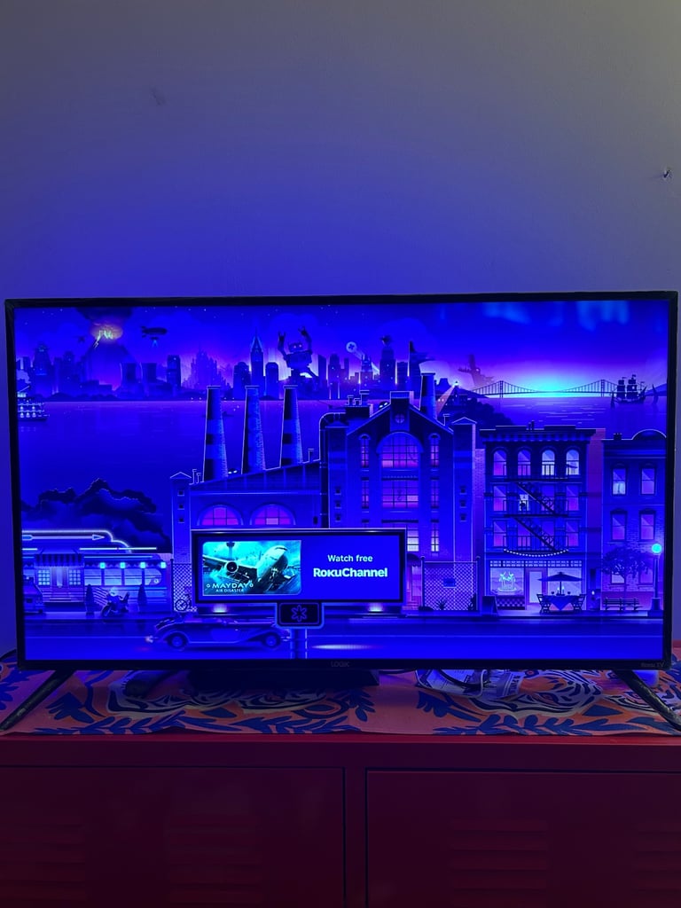 image for Logik 40” Roku Smart Full HD HDR LED TV – Like New, Screen Wrap Still On