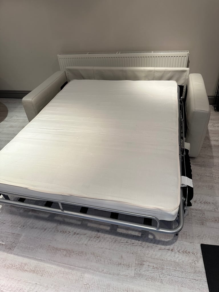 Natuzzi (Brand) cream leather sofa bed 