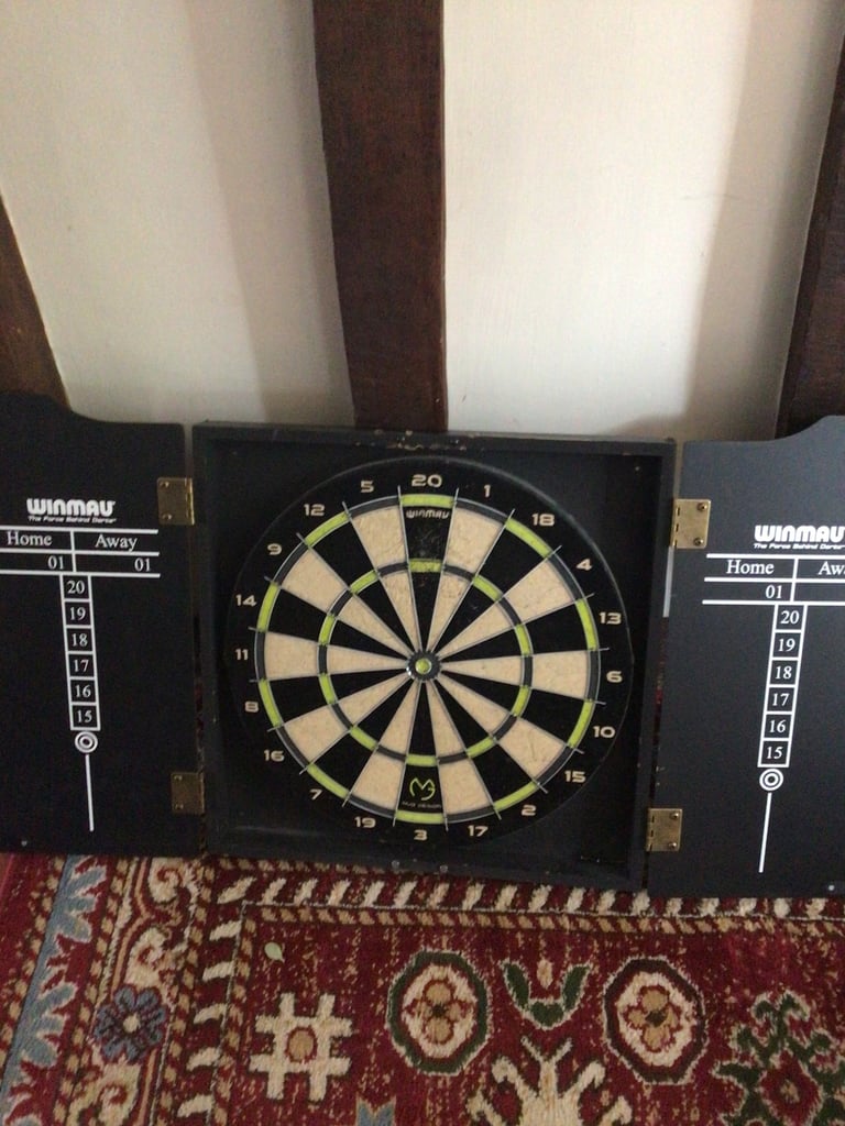 Winmau dartboard in cabinet 