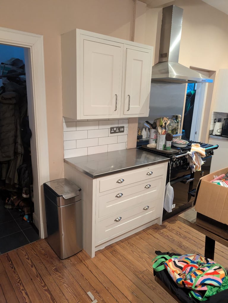 Hand painted solid wood shaker kitchen with steel worktop and Belfast sinks. 