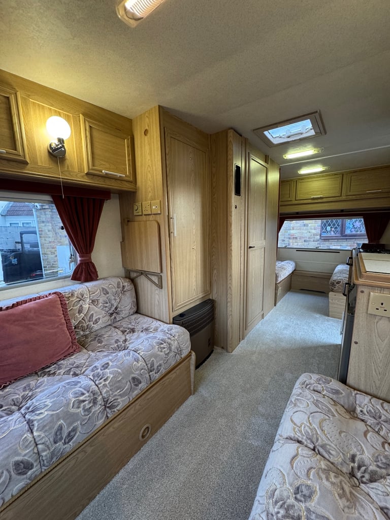 1998 Lunar Solar 465-5 Berth Caravan, Full Size Awning, Double Dinette Family Layout.