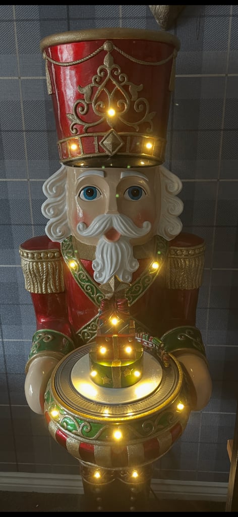 Large Christmas nutcracker 5ft tall lights up and plays music. Like new