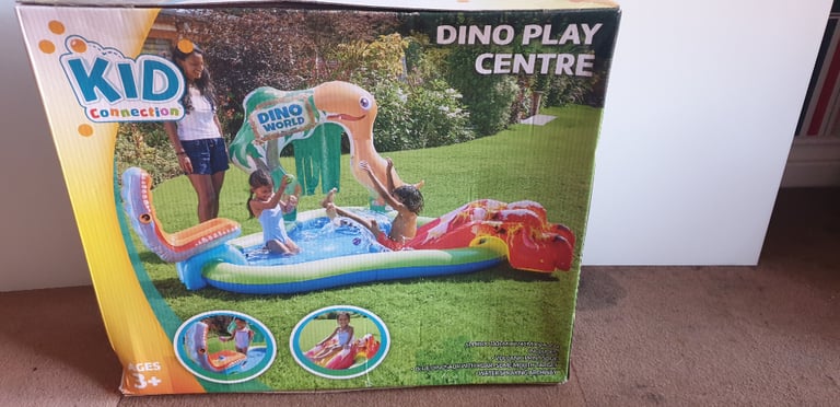 Dino water play activity centre and Summer Vibes bouncy castle boxed as new.