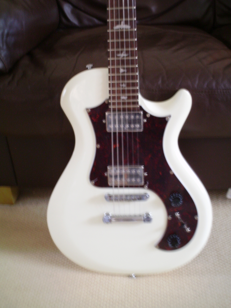 PRS SE in ANTIQUE WHITE. TOTALLY UNMARKED and in AS NEW CONDITION.