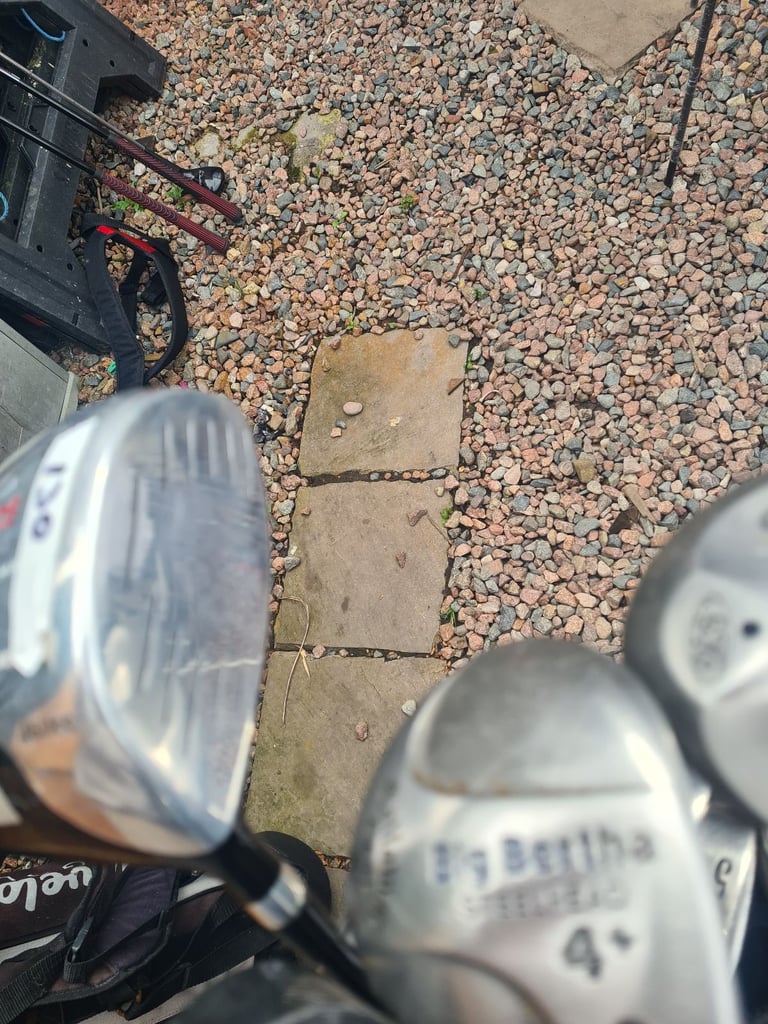 Full set of golf clubs.