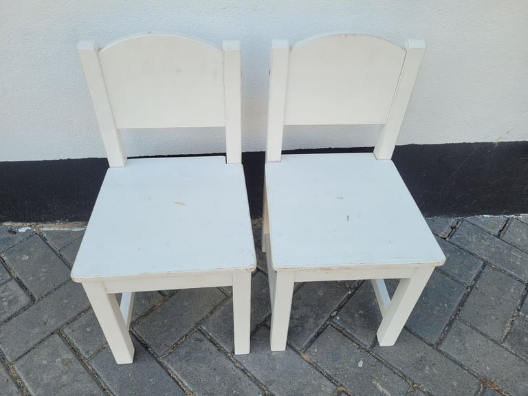 2 white Preschool Nursery school age wooden chairs