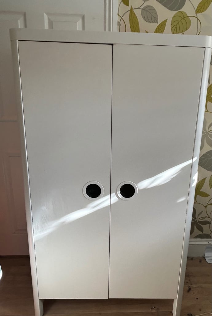 White compact wardrobe