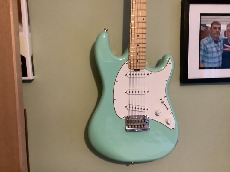 Stirling  Cutlass by music man Guitar