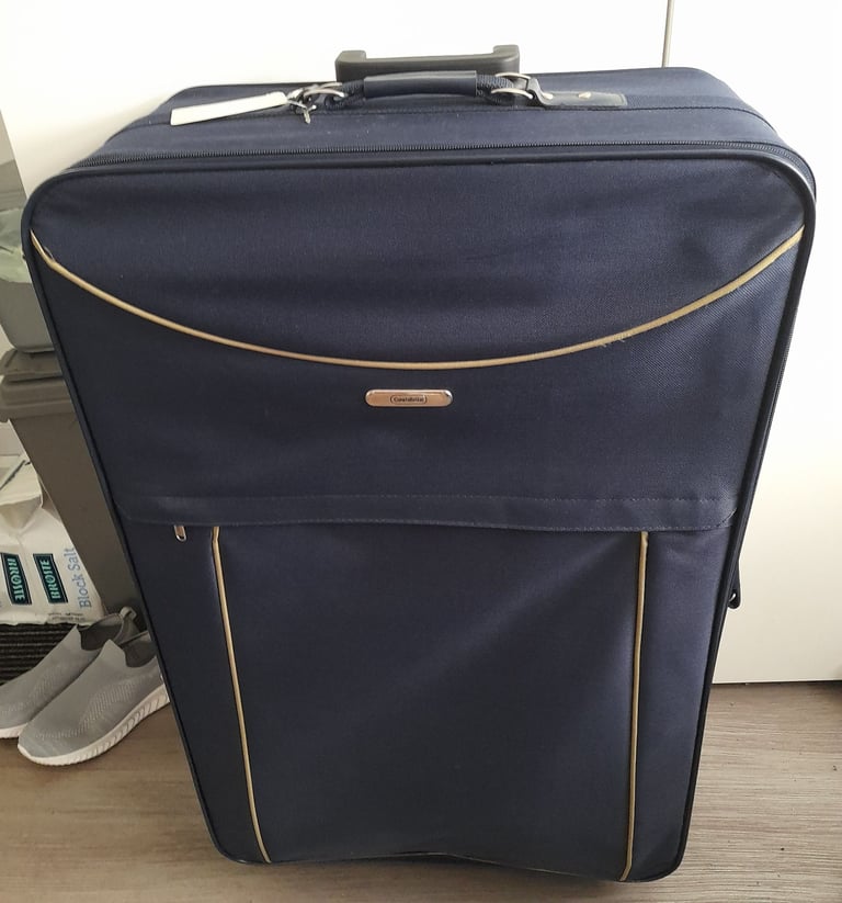 Large navy blue suitcase 32"H x 20"W x 9"D with wheels 