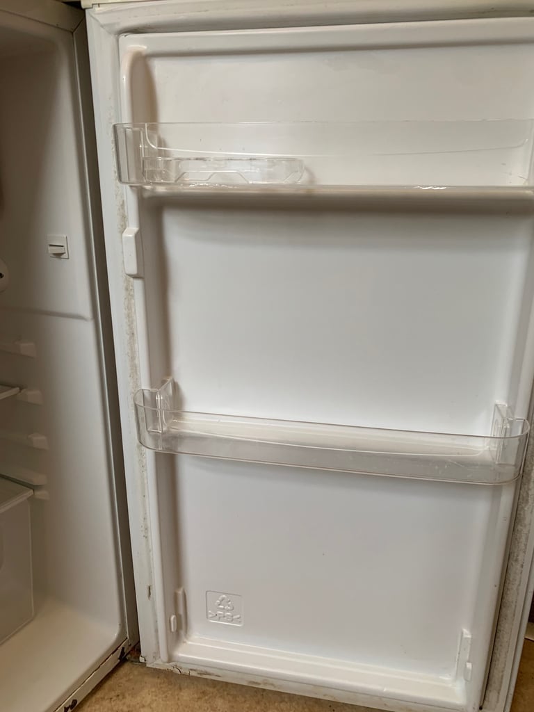 Small fridge with freezer compartment