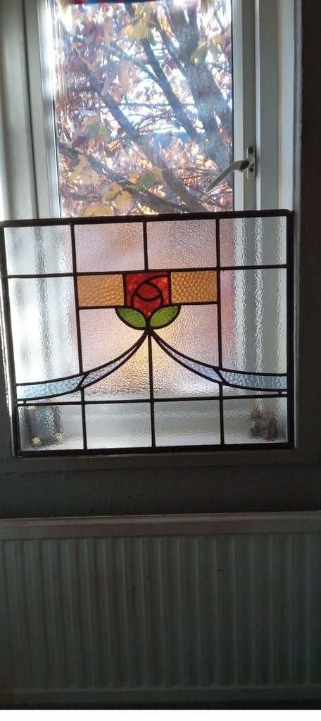 English Rose design stained glass window panel.