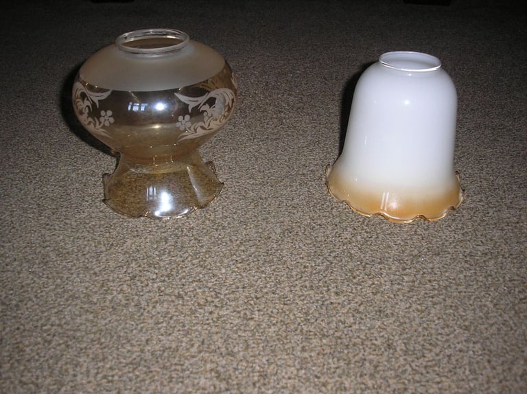 Bronze coloured glass light globe, white one sold.