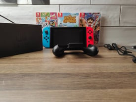 Nintendo switch & three games for sale
