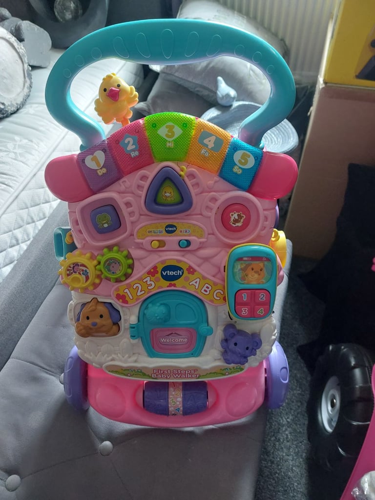 Vtech baby walker pink in new condition 