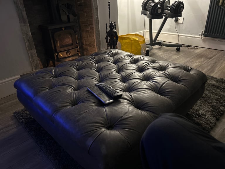 Grey leather chesterfield footstool