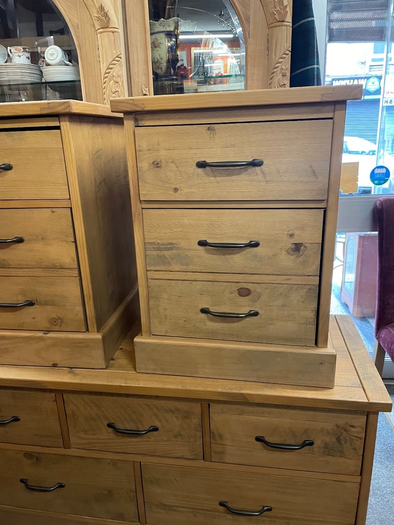 Two solid wood bedside cabinets
