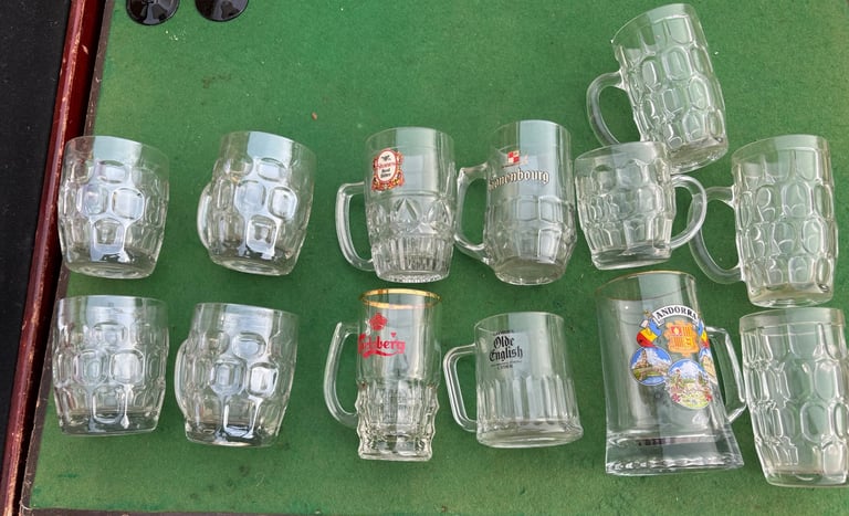Mixed lot of half pint handled glasses some vintage 