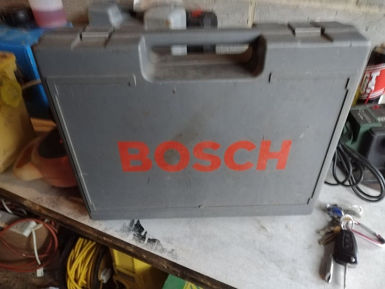 image for Bosch cordless drill driver with battery and charger with carry case good working order 