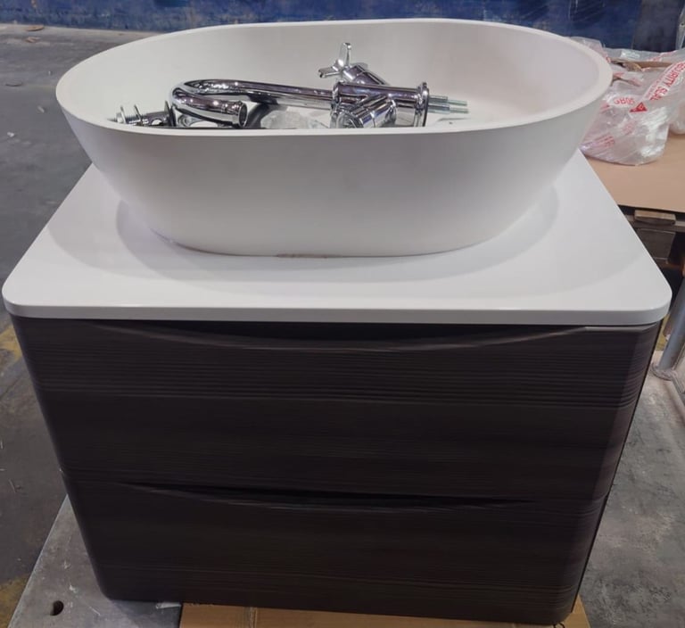 Bathroom cabinet + tap