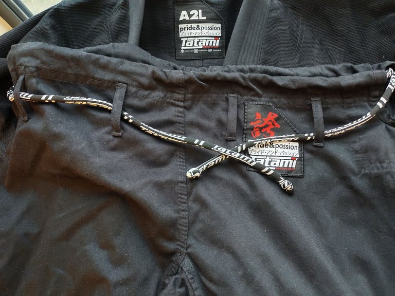 Tatami™  bjj gi with white belt, size A2L, used less than a week.  