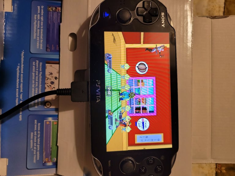 Sony playstation vita boxed plus games