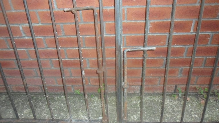 PAIR OF WROUGHT IRON GATES