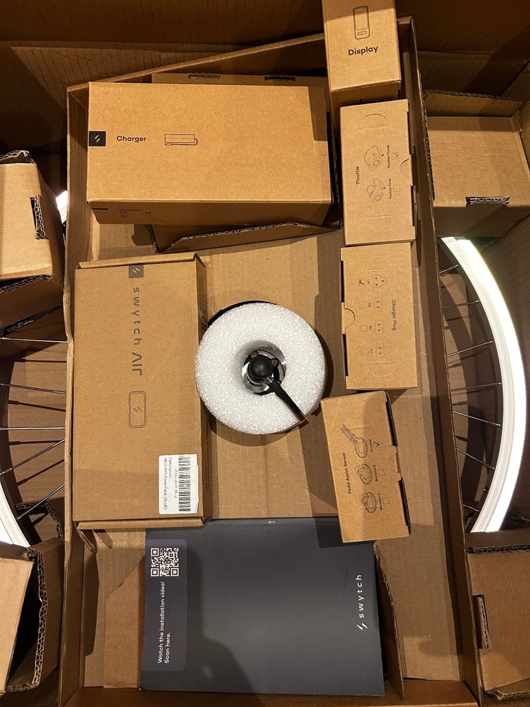 Brand new Swytch electric bike conversion kit with accessories