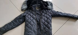 BARBOUR black padded jacket with fur hood.
