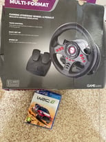 Multi format gaming steering wheel & pedals & ps4 game 