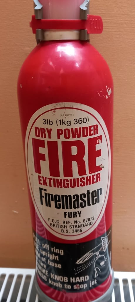 image for Unused Dry Powder Fire Extinguisher With Hanging Bracket 