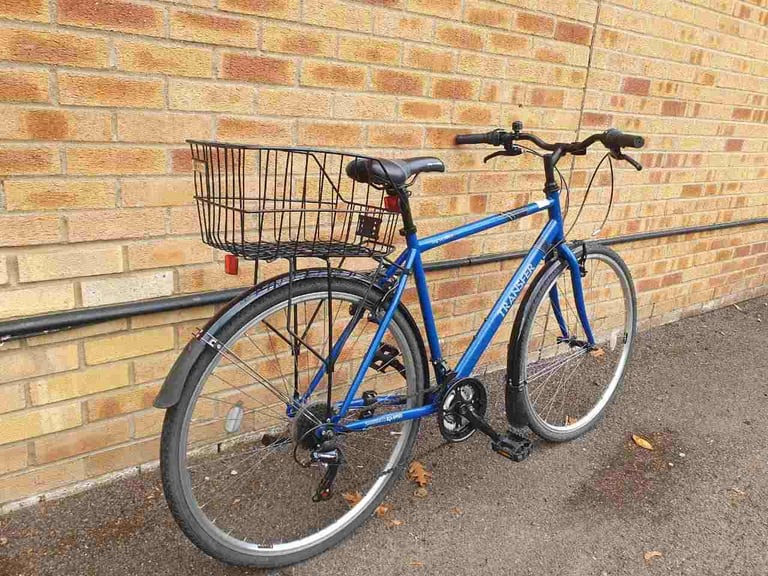 Lightweight Aluminium Apollo Transfer Hybrid bike in good condition with rear basket