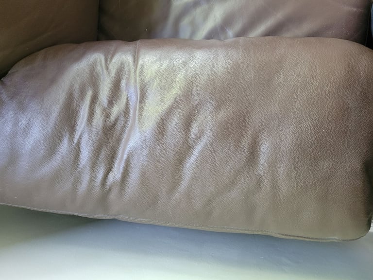 Small brown leather sofa- free