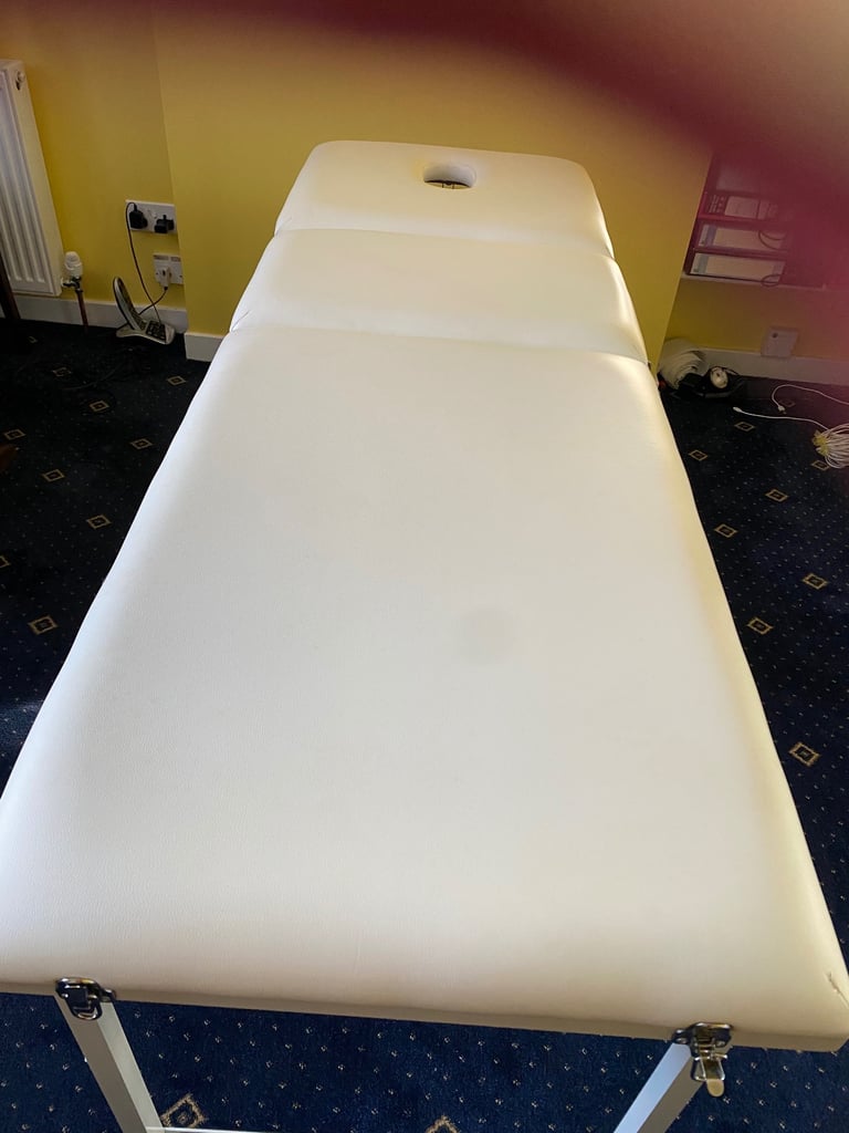 Massage table
