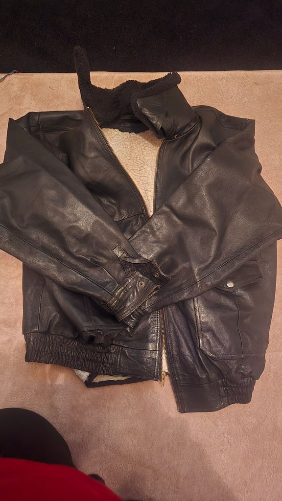 image for Black leather jacket
