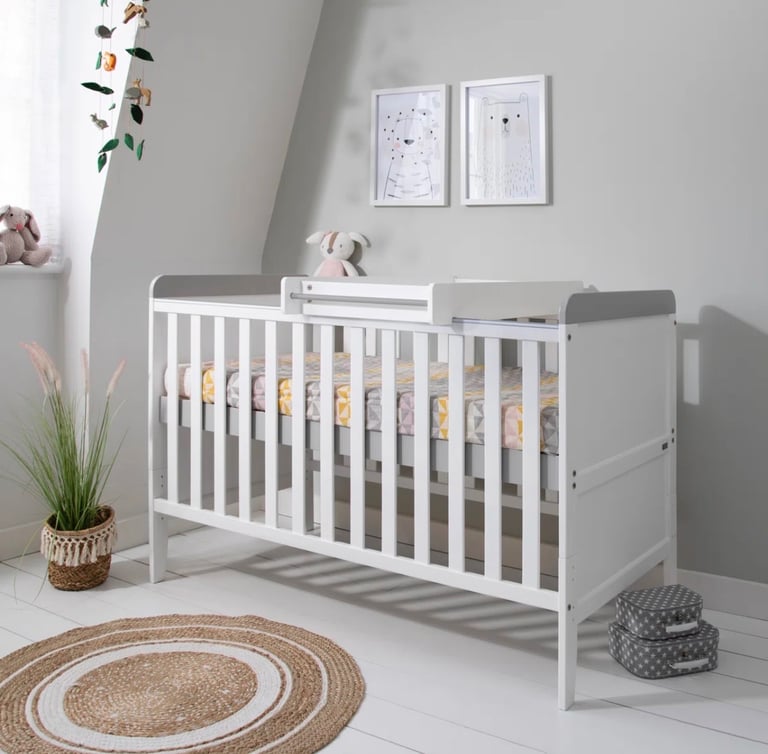 Cot bed and top changer 