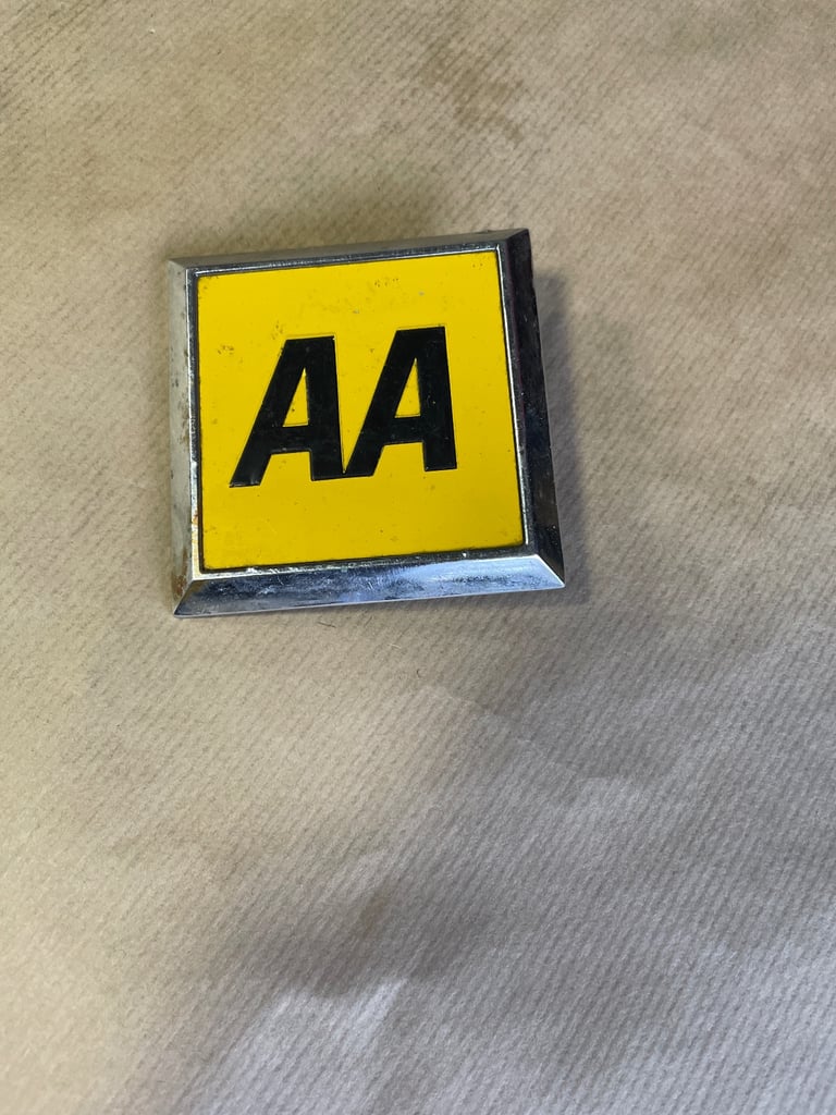 AA chrome car badge from 1945 + 1 other