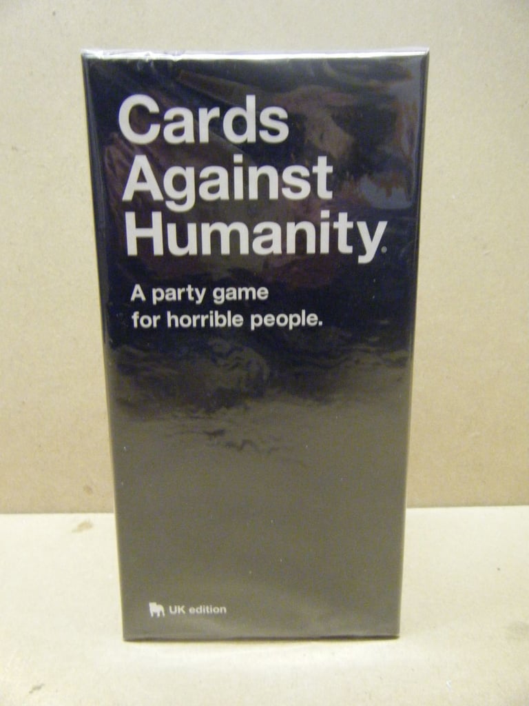 image for (CARDS AGAINST HUMANITY) UK EDITION. Adult Card Game. New & Sealed.