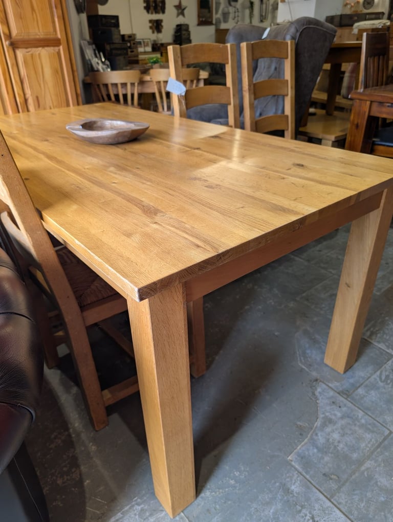 Solid oak dining table and chairs 