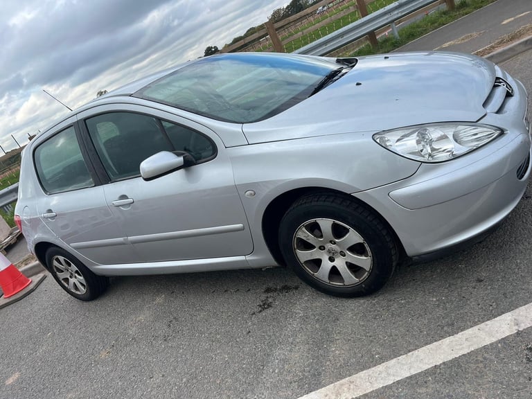 1.6 petrol peugeout 307  has 128k on the clock slight blow on the exhaust