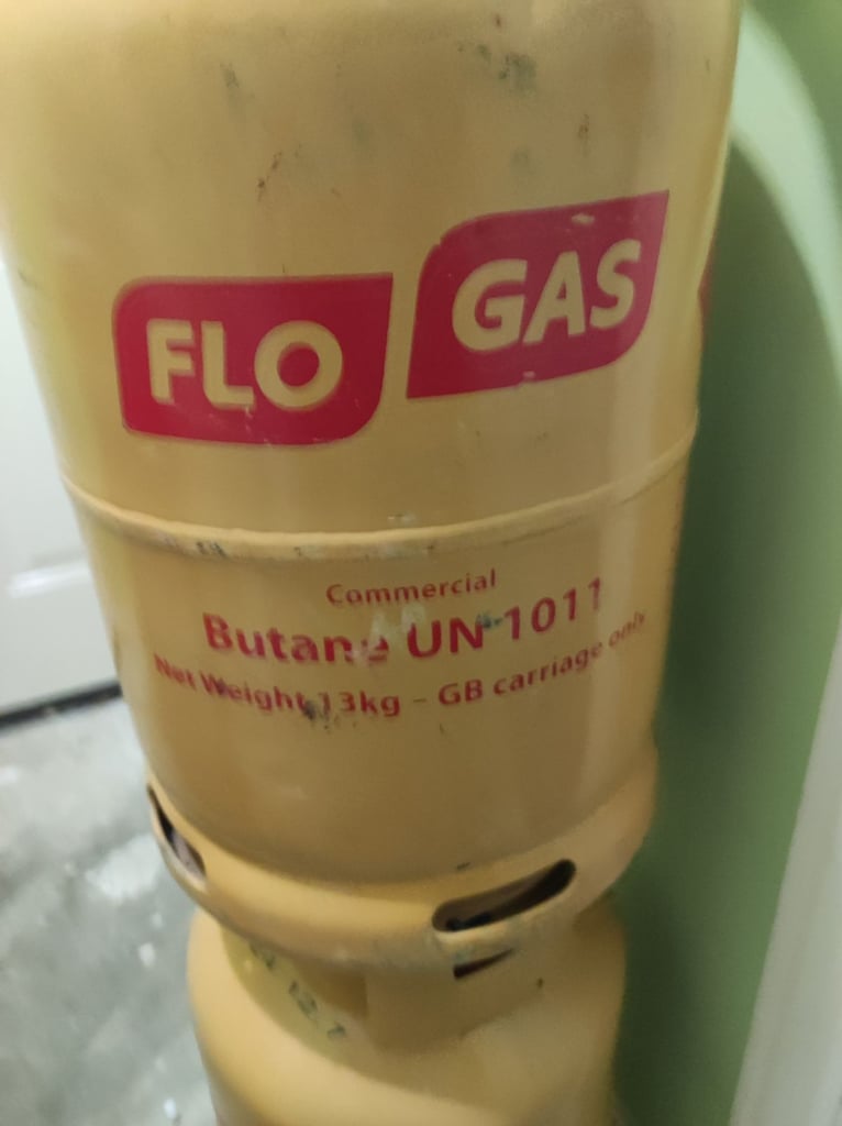 Gas depot , portable gas heater on wheels, plus 2 flo gas canisters 