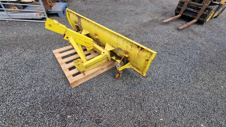 Tractor three point linkage angled snow spring loaded 