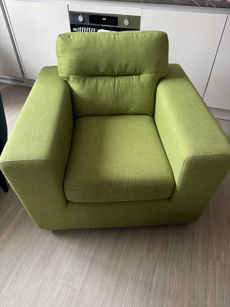 Green cozy armchair