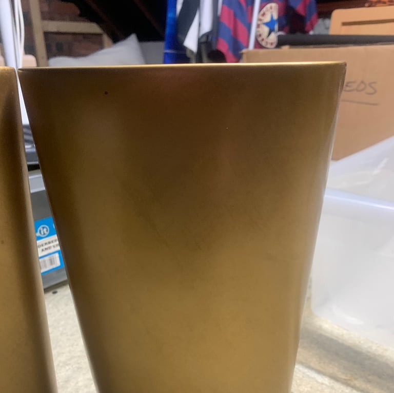 Pair of gold coloured vases