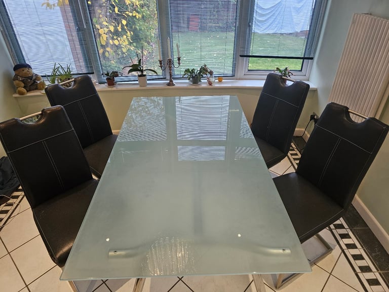 image for Glass dining table and 4 x matching high back chairs