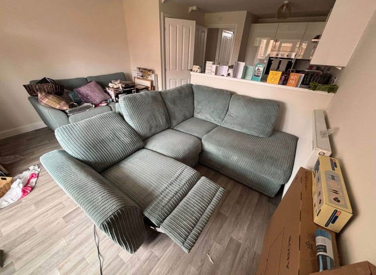 Right hand reclining corner sofa